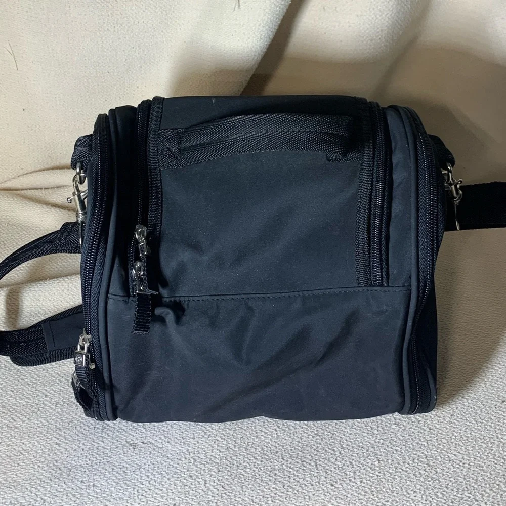 black travel bag for make up or toiletries